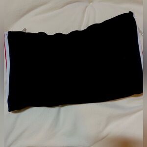 black tube top with blue, white, and, red stripes on the sides